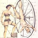 Submissive is tied upside down on the wheel and cums with a forcible handjob